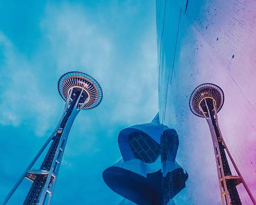 space needle gray and white tower under blue sky and white clouds during daytime seattle